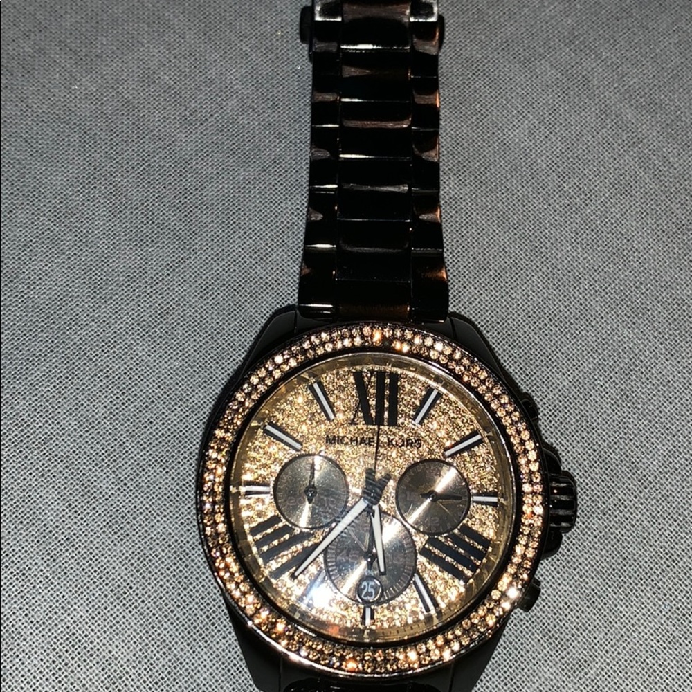 Michael Kors Black and Gold interior watch.